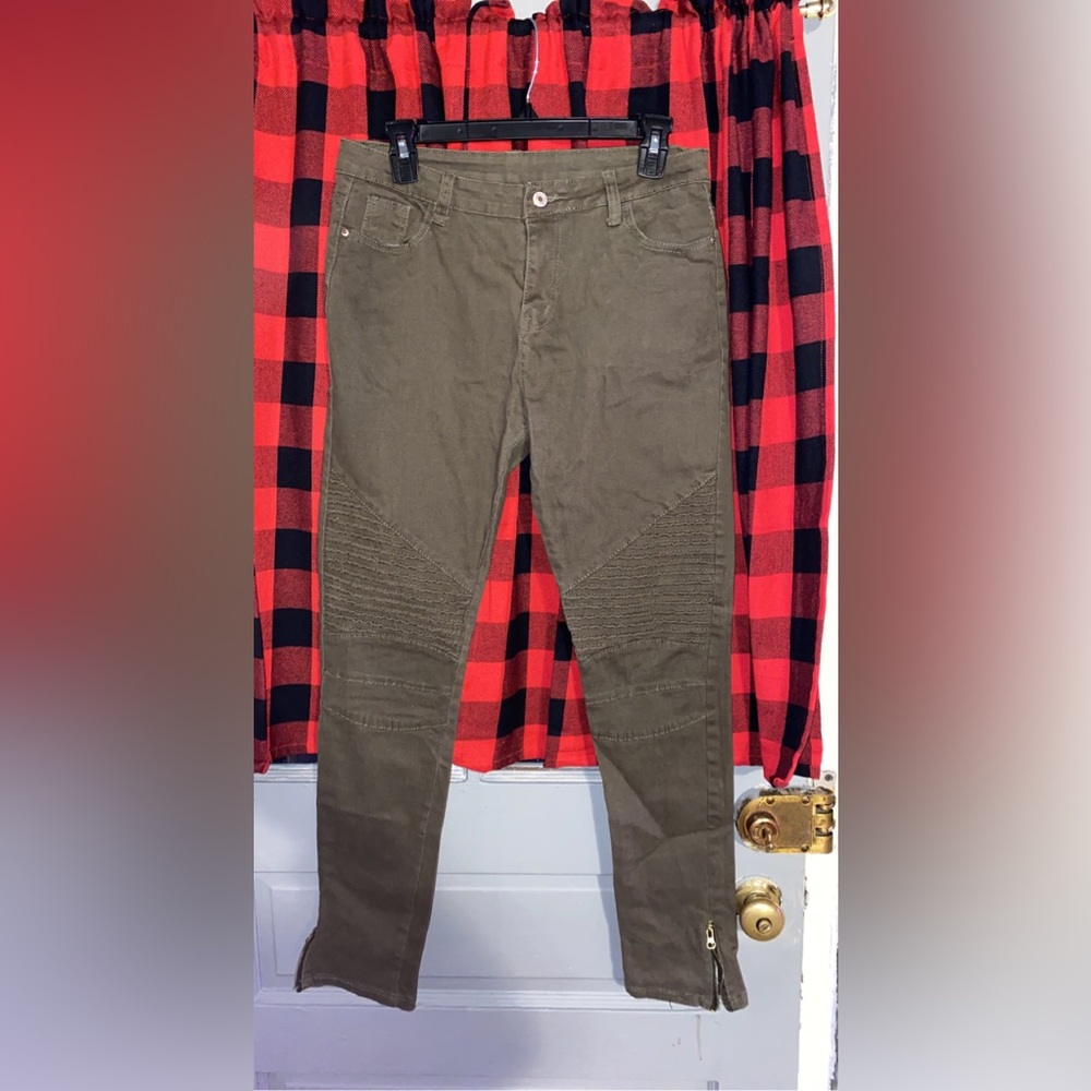Green jeans with ankle zippers